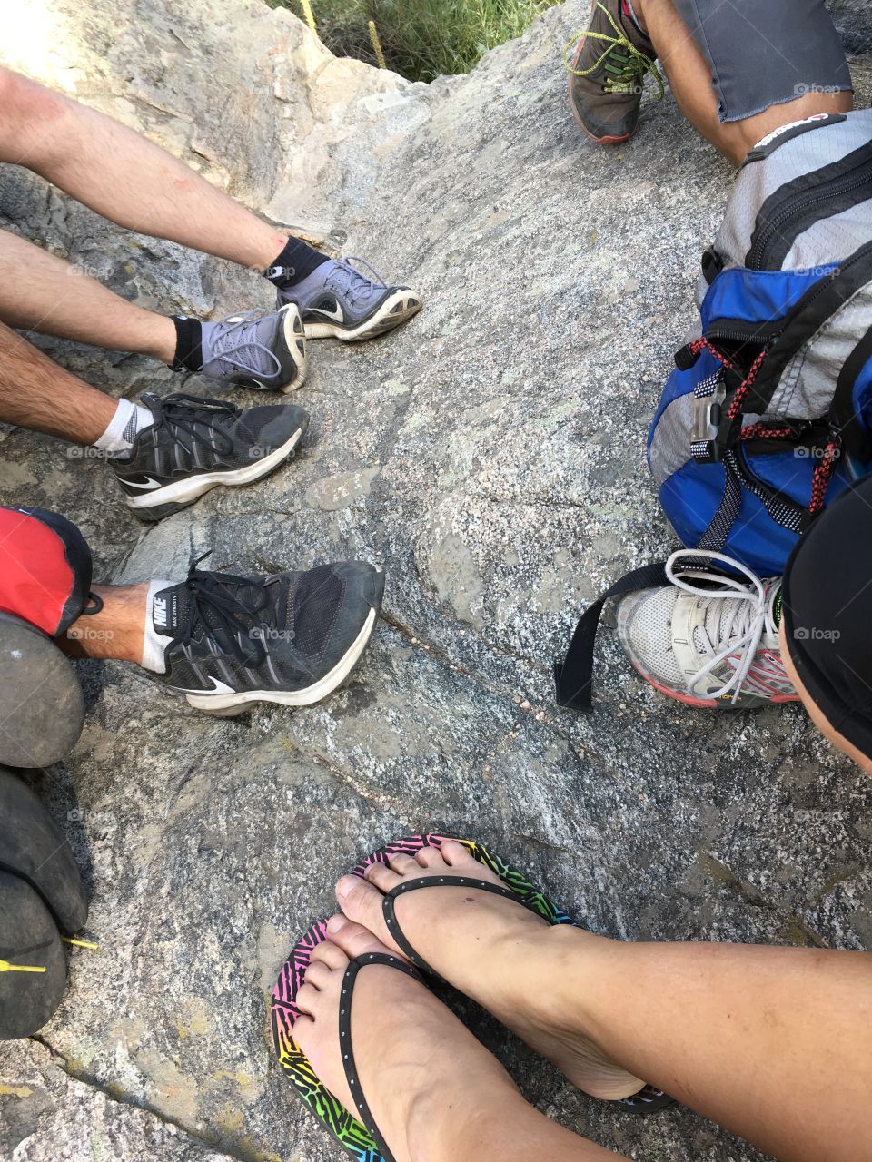 Colorful shoes of a group of friends after a day of climbing