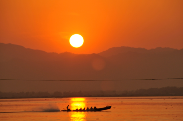 myanmar boat sunset lake by fujijapan