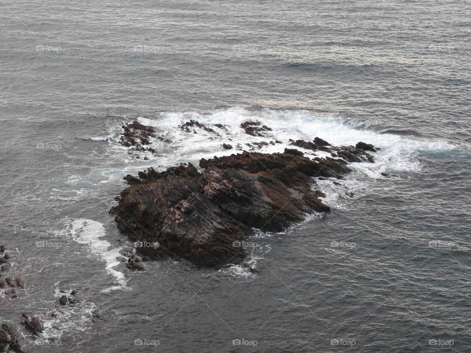 Rocks and waves in the sea