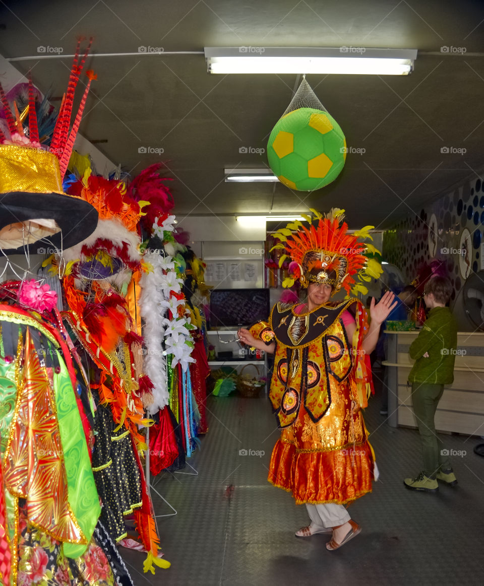 Mature woman in carnival costume