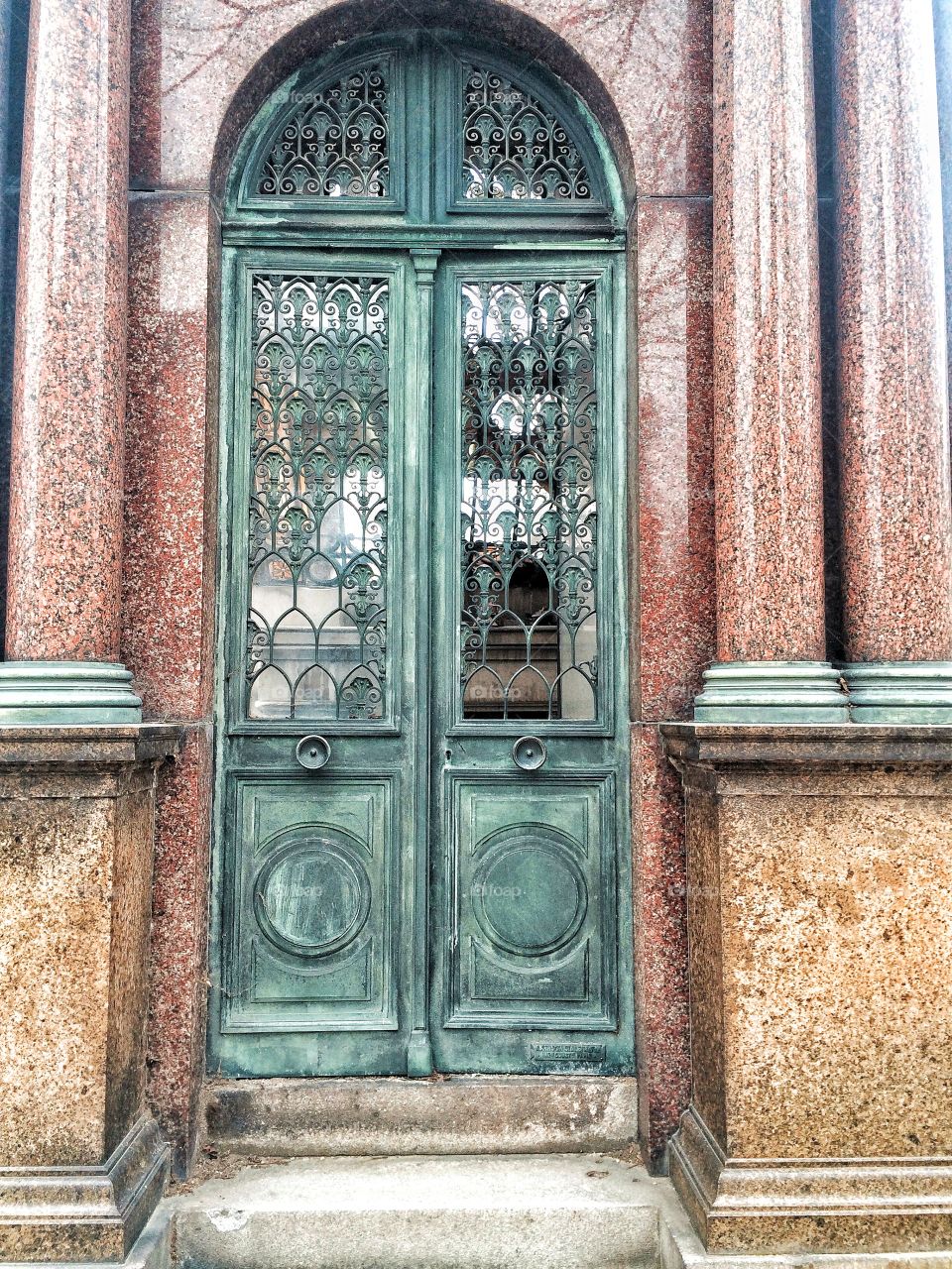 Green door with marble 