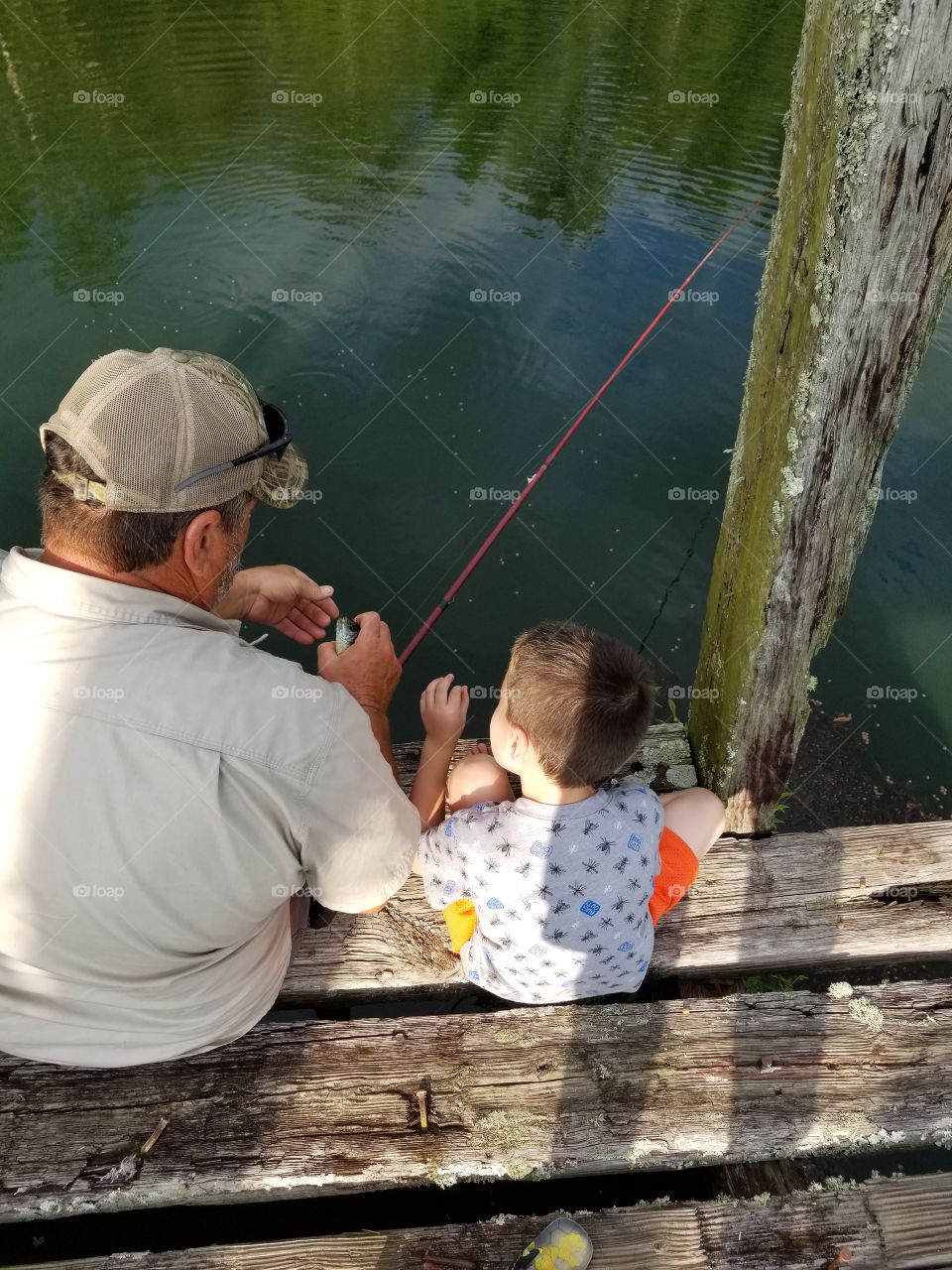 grandpa and grandson fishing