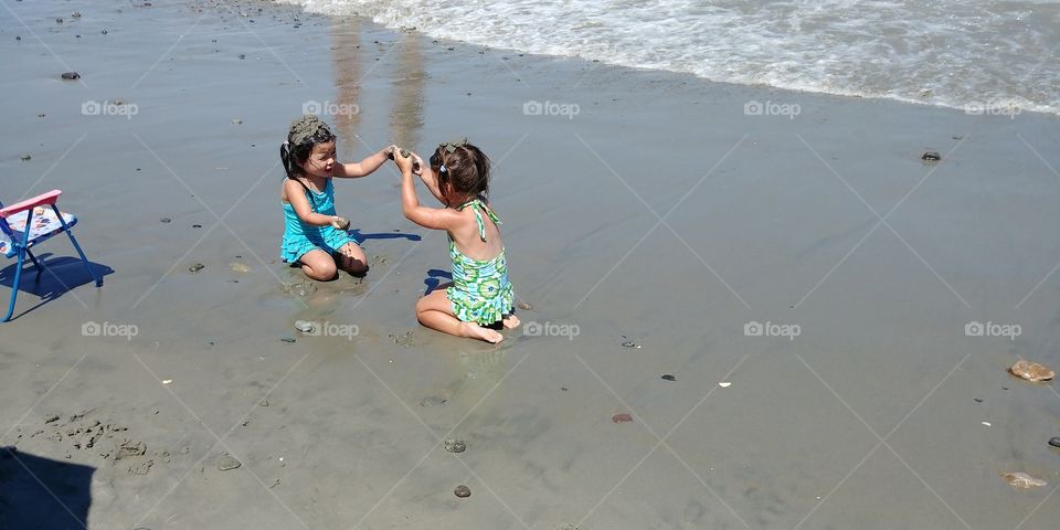 Let's put sand in our hair!