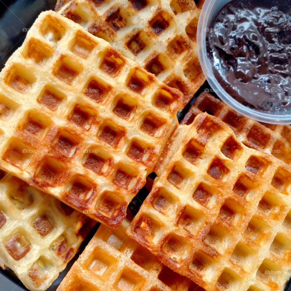 Delicious waffle with chocolate pasta