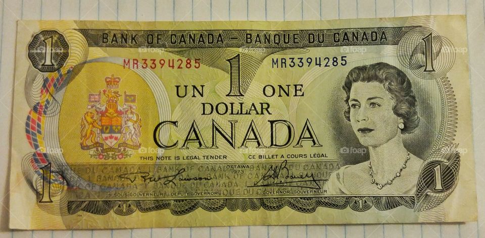 Old Canadian paper dollar bill Front