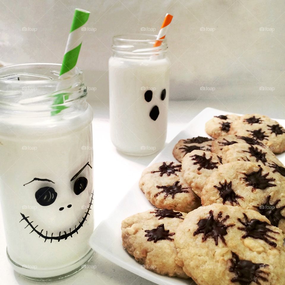 Halloween. Milk and spider cookies