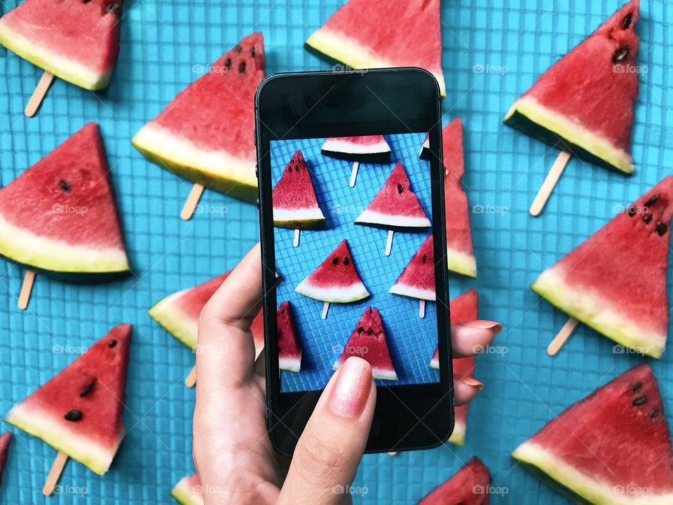 Taking a photo of watermelon 