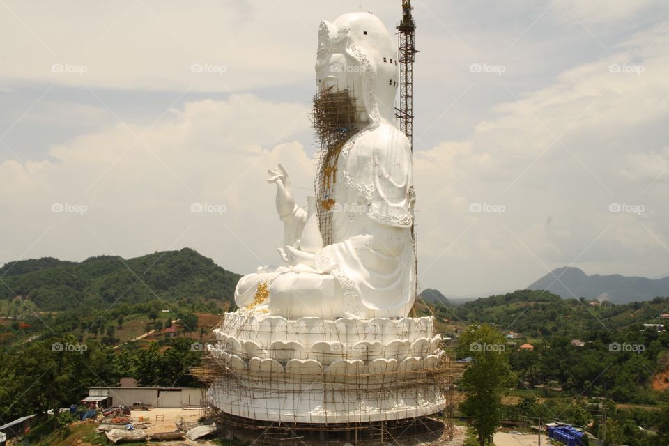 Buddha in construction. Strange beared Buddha in Chiang rai province