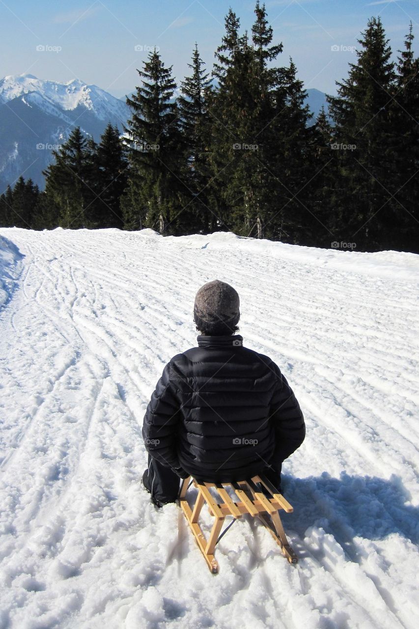 Man sledding