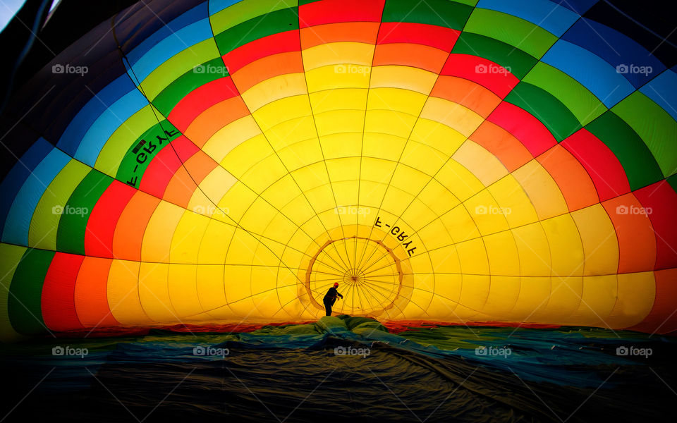 man inside a balloons