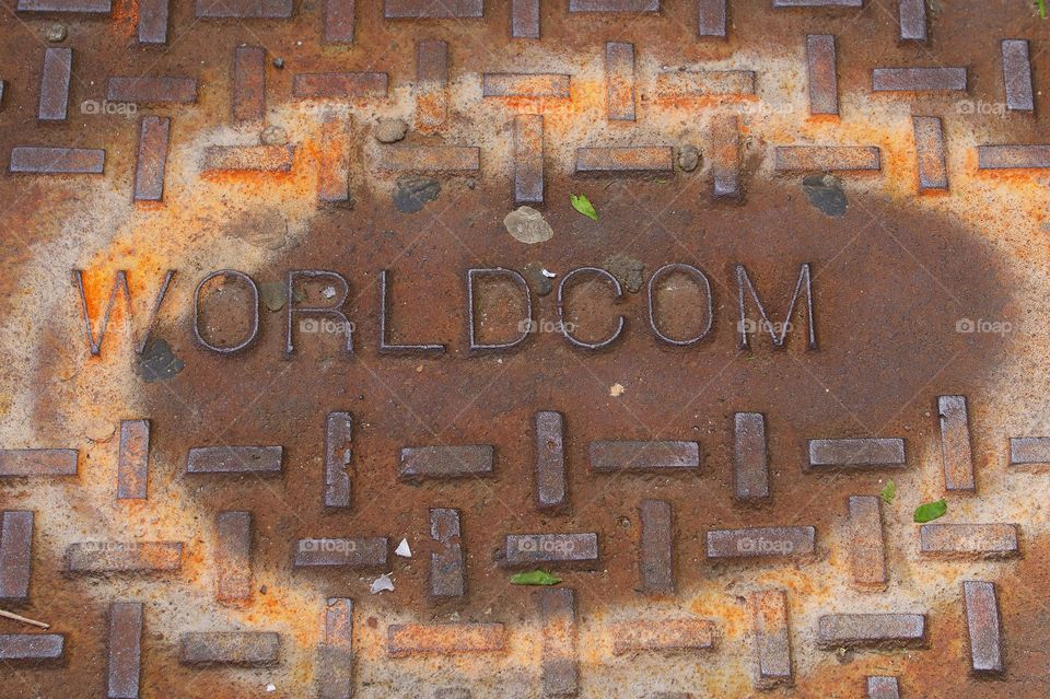 A WorldCom manhole cover photographed May 15, 2017.  This telecommunications corporation filed the largest bankruptcy in U.S,A history in 2002.