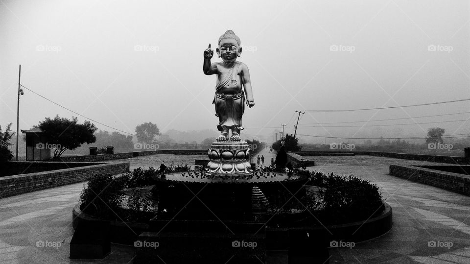 Baby Buddha with a rather heavy message...pointing in the right direction to be instantly reminded that once in a while it might be worth to act mindful...