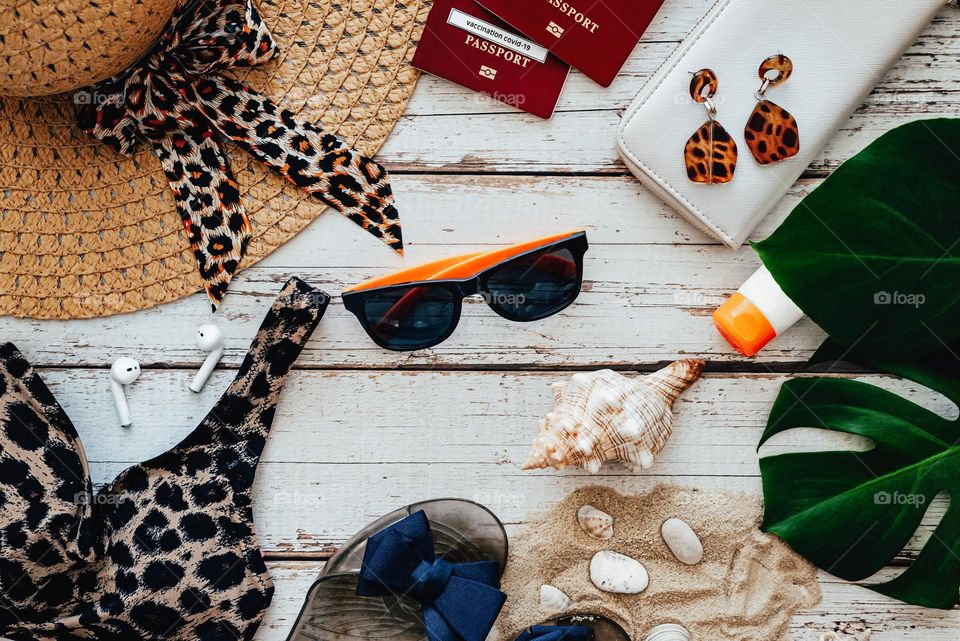 flat lay view of summer holiday accessories, shoes