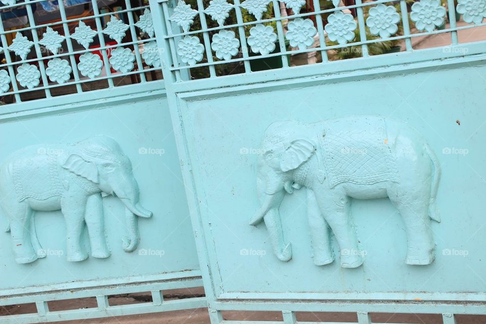 a blue elephant gate