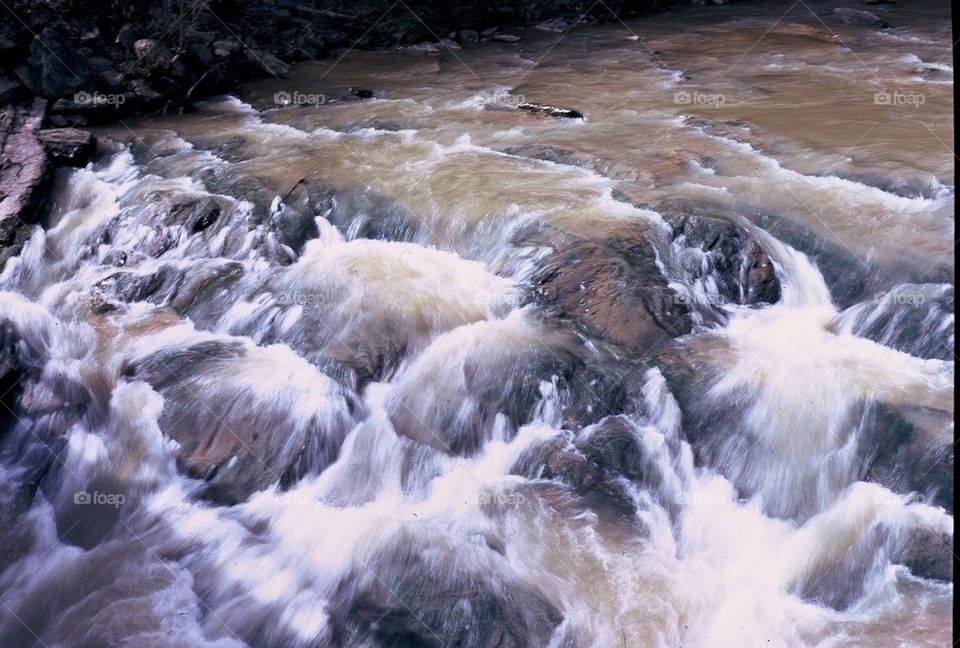 Rushing water over rocks