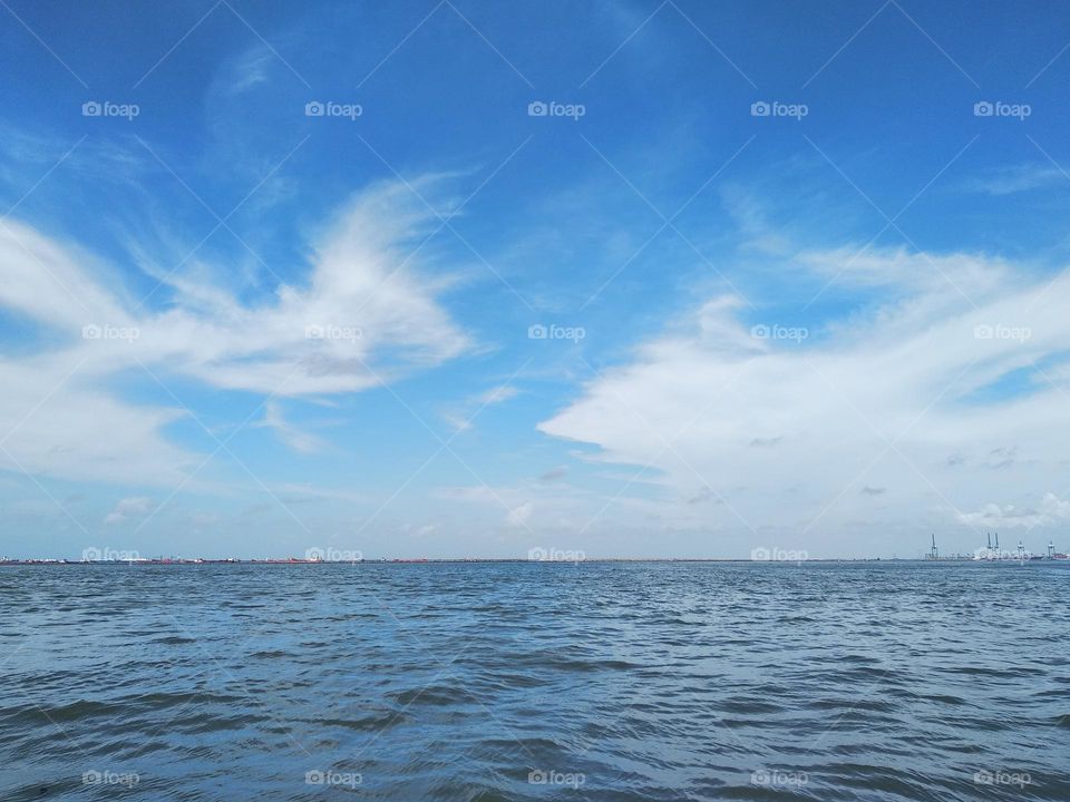 Cloudscape on the sea, unique pattern of clouds, abstract "flying horse and sky dragon fight". No filters.