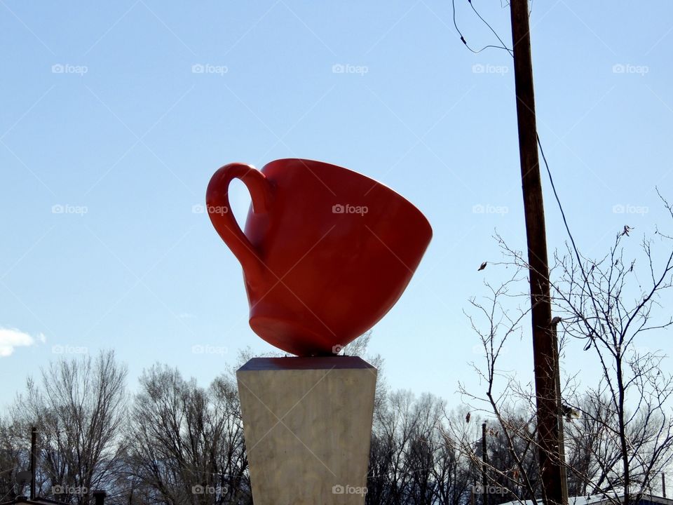 Red coffee cup statue 