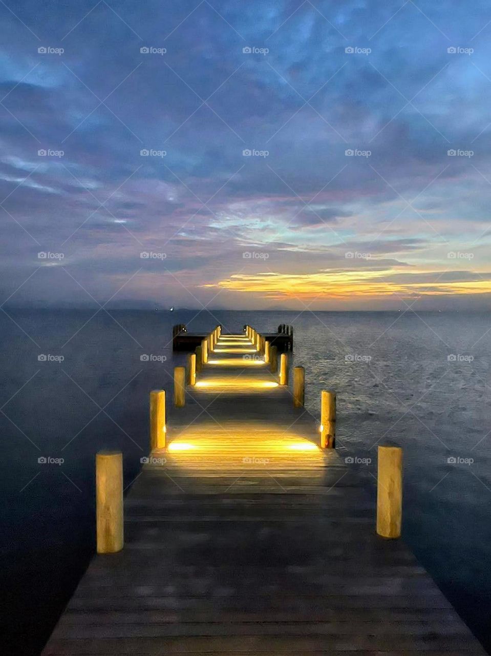 Evening walk by the footbridge of beach at Krong Kaeb Kep Province Cambodia