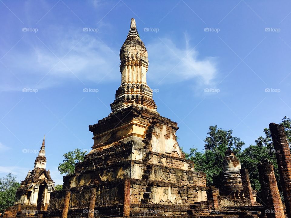 Wat chedi seven rows temple in Sukhothai, Thailand 