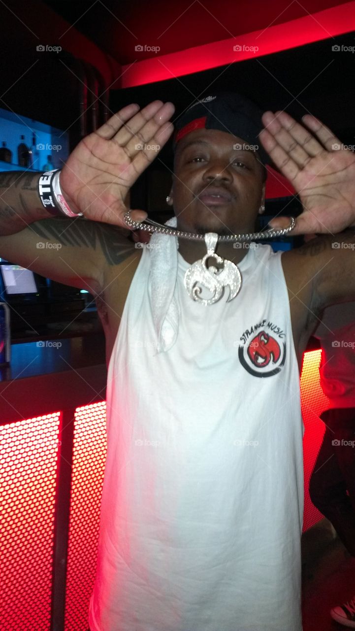 Stevie Stone showing off his strange music necklace