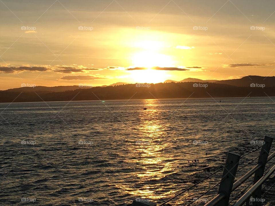 Sunset over mountain and sea