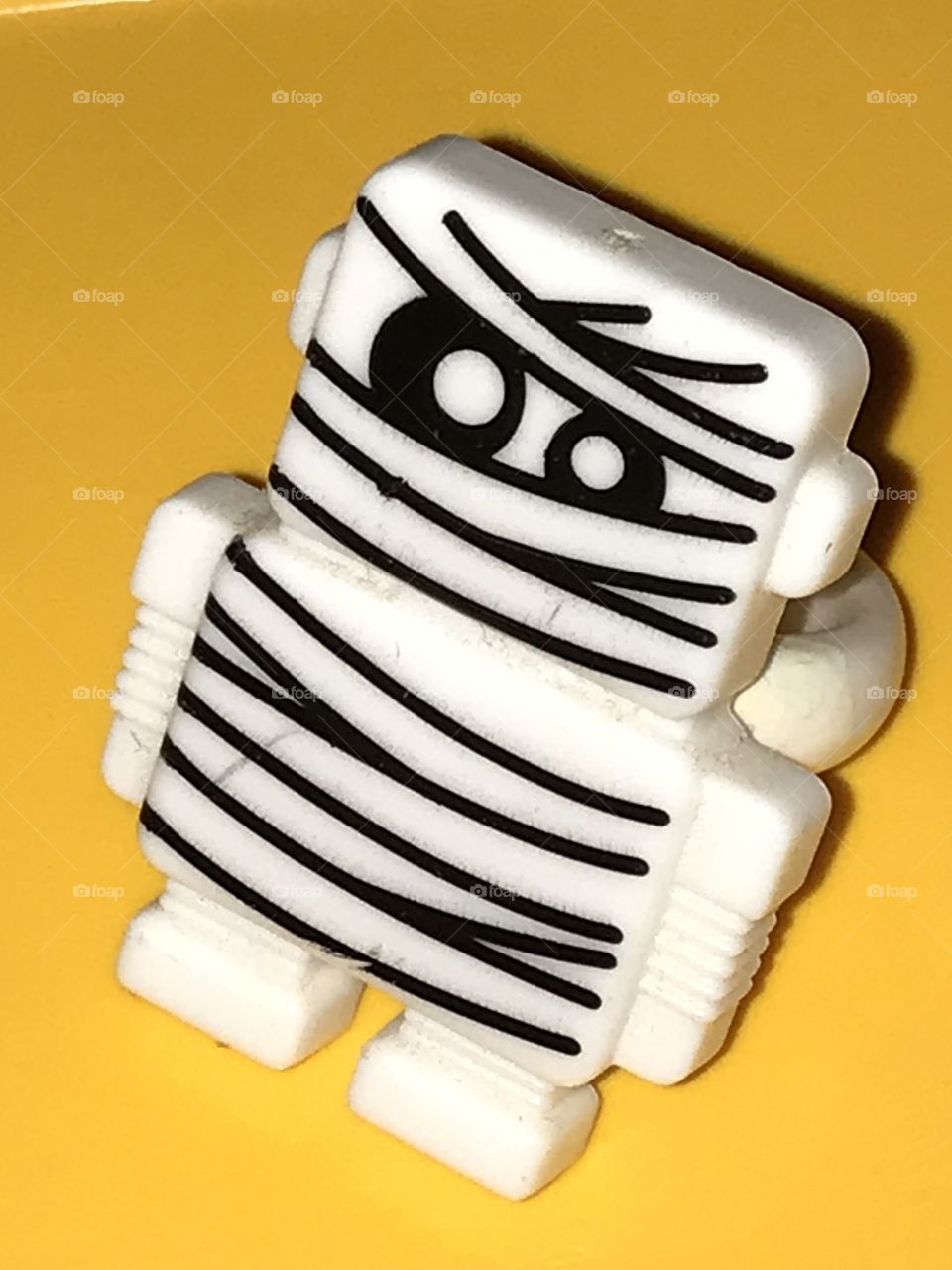 A mini Egyptian mummy. He is a funny, cute sight for sore eyes.