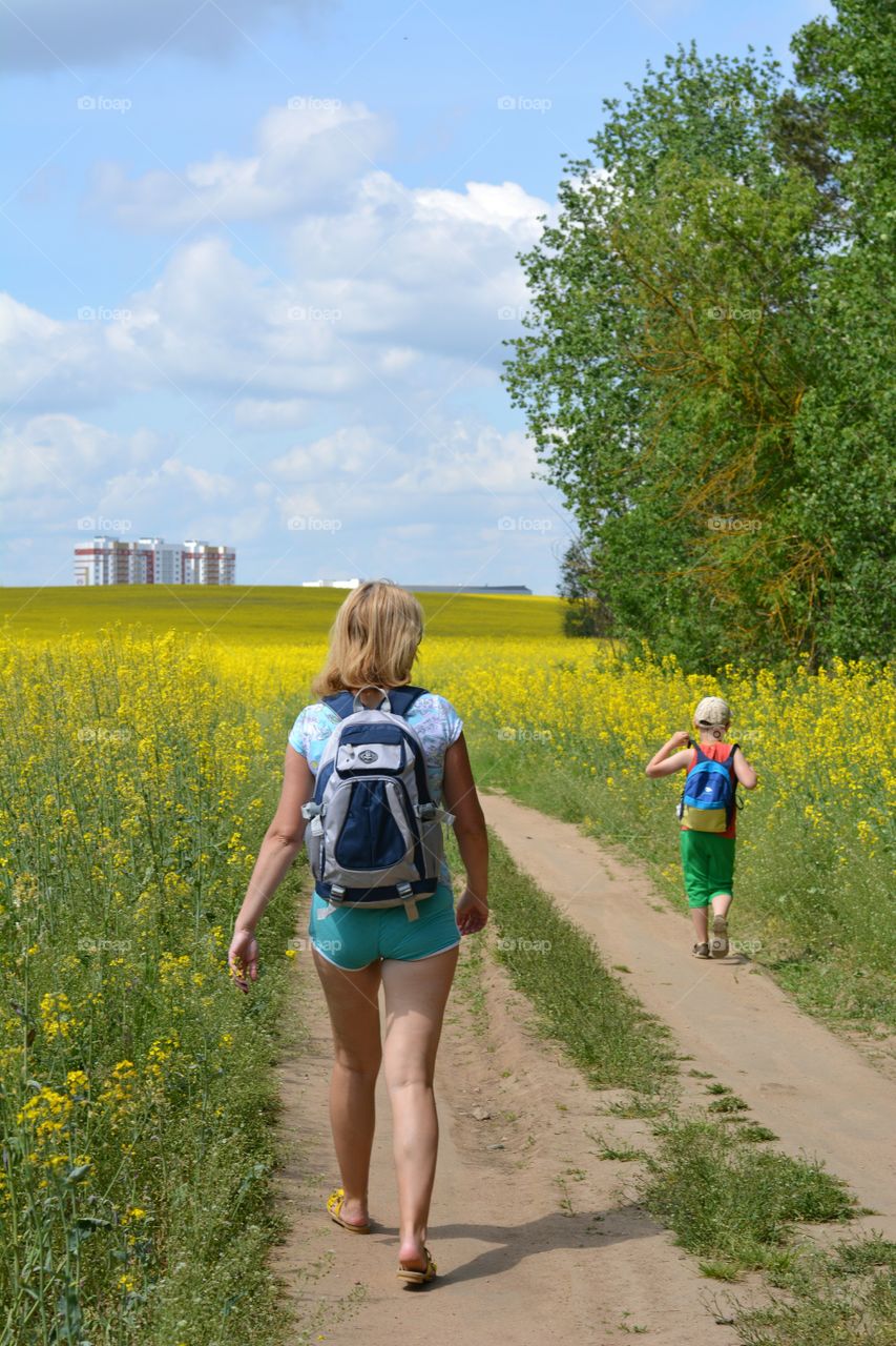 morning walking family woman and child boy summer beautiful landscape