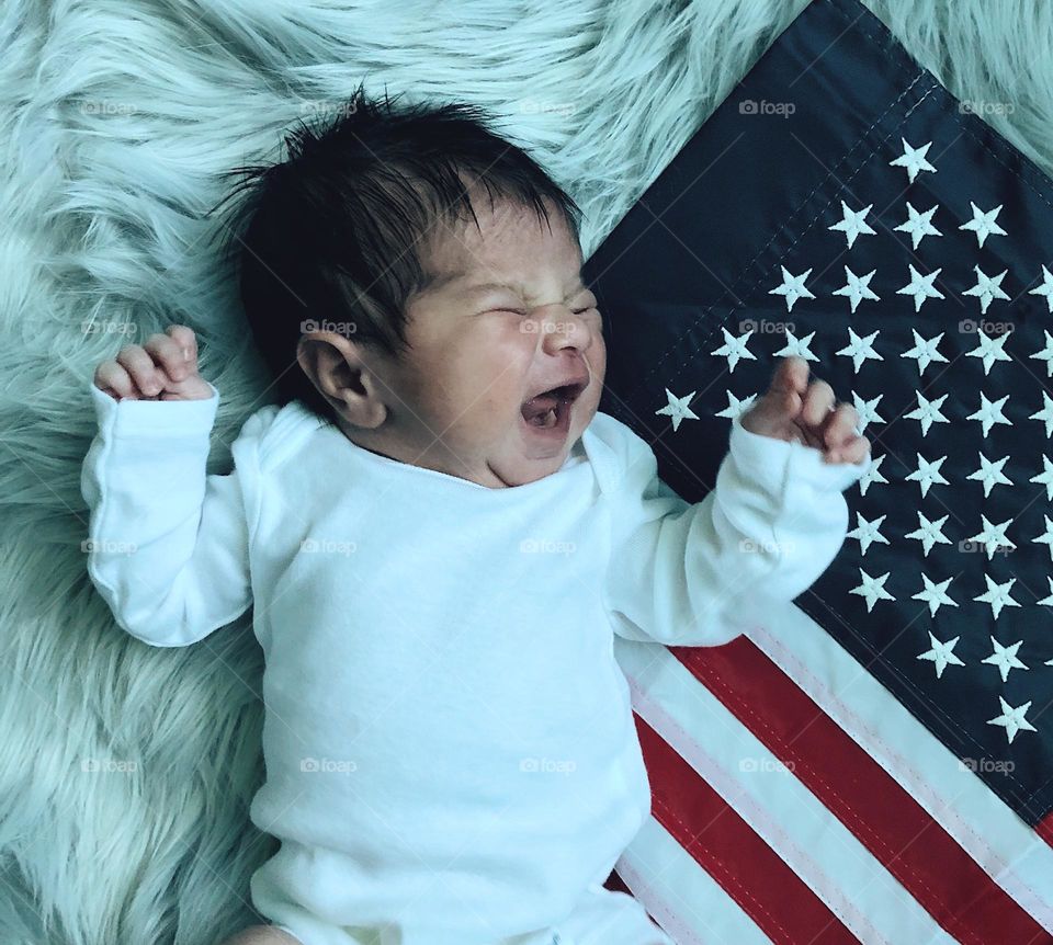 Baby screaming and crying at the United States flag, baby cries for Independence Day, baby celebrating Fourth of July, infant girl reacts to flag, crying for America