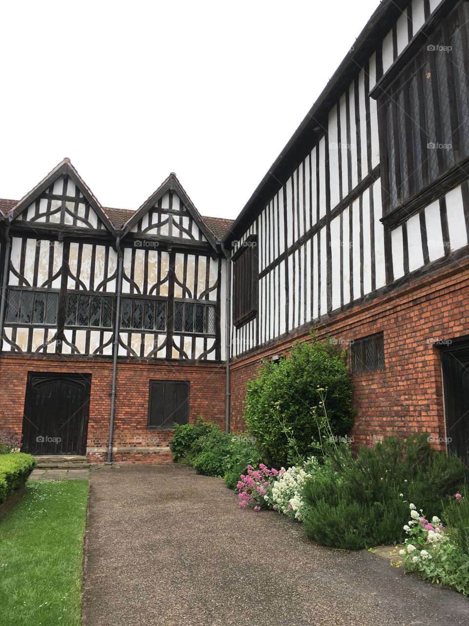 Exterior view of brickwork and timber framing of the mediaeval Manor House of Gainsborough Old Hall in England