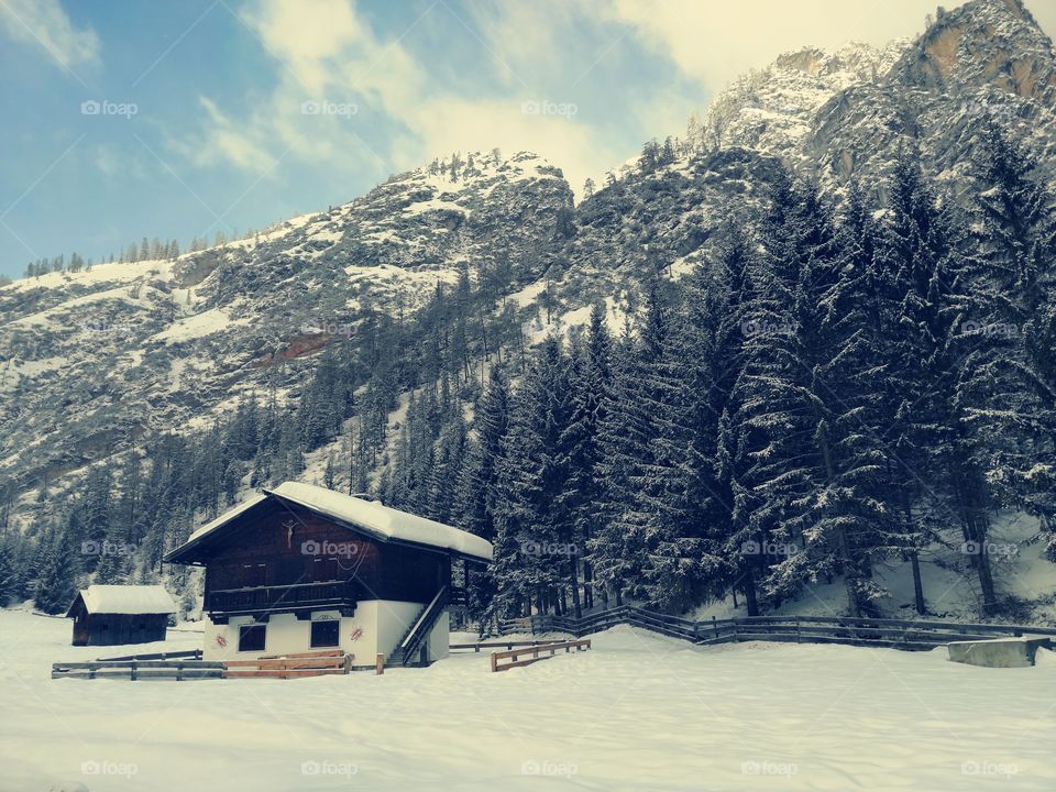 House in South Tyrol with mountain background.