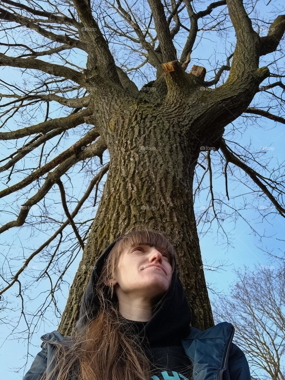 a selfie with a perennial tree in early spring