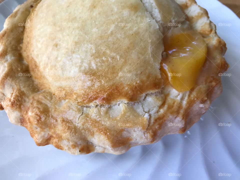 Mini-sized peach pie with cinnamon