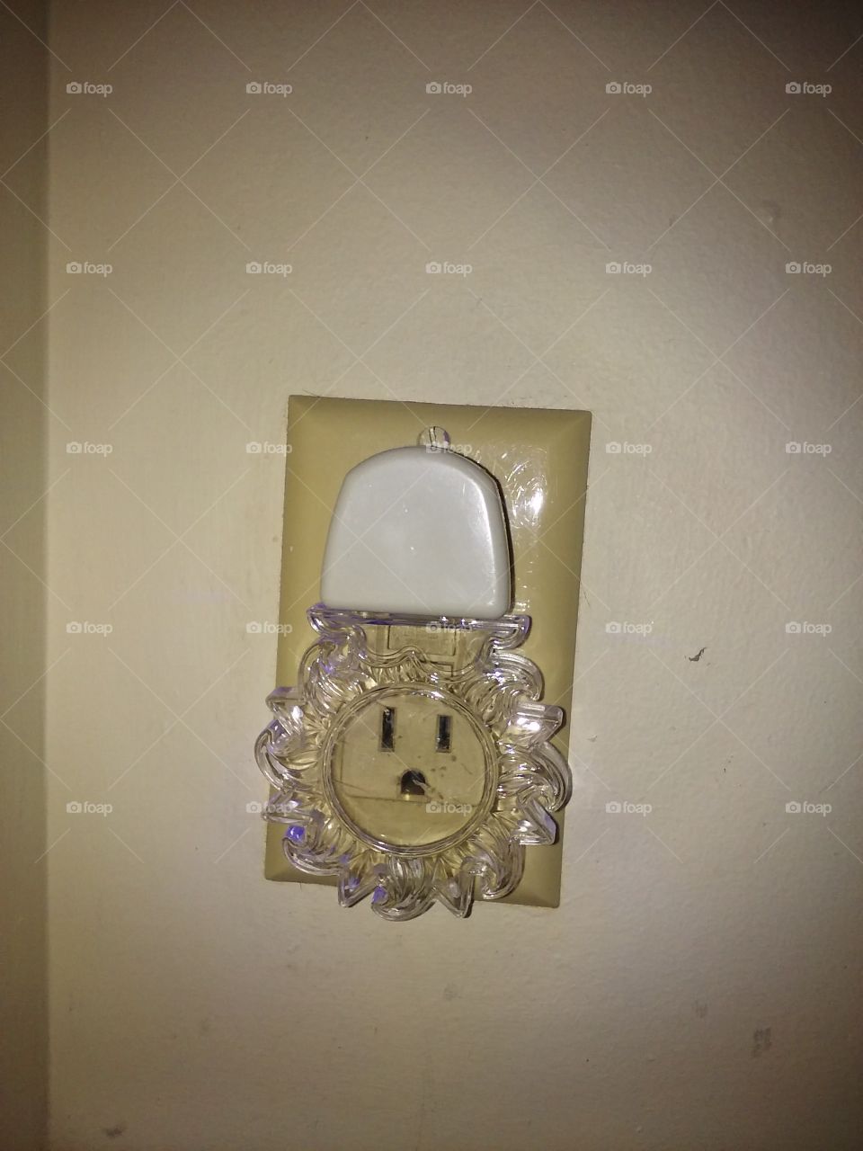 LED night light plugged in upside down and looks like it's scared!