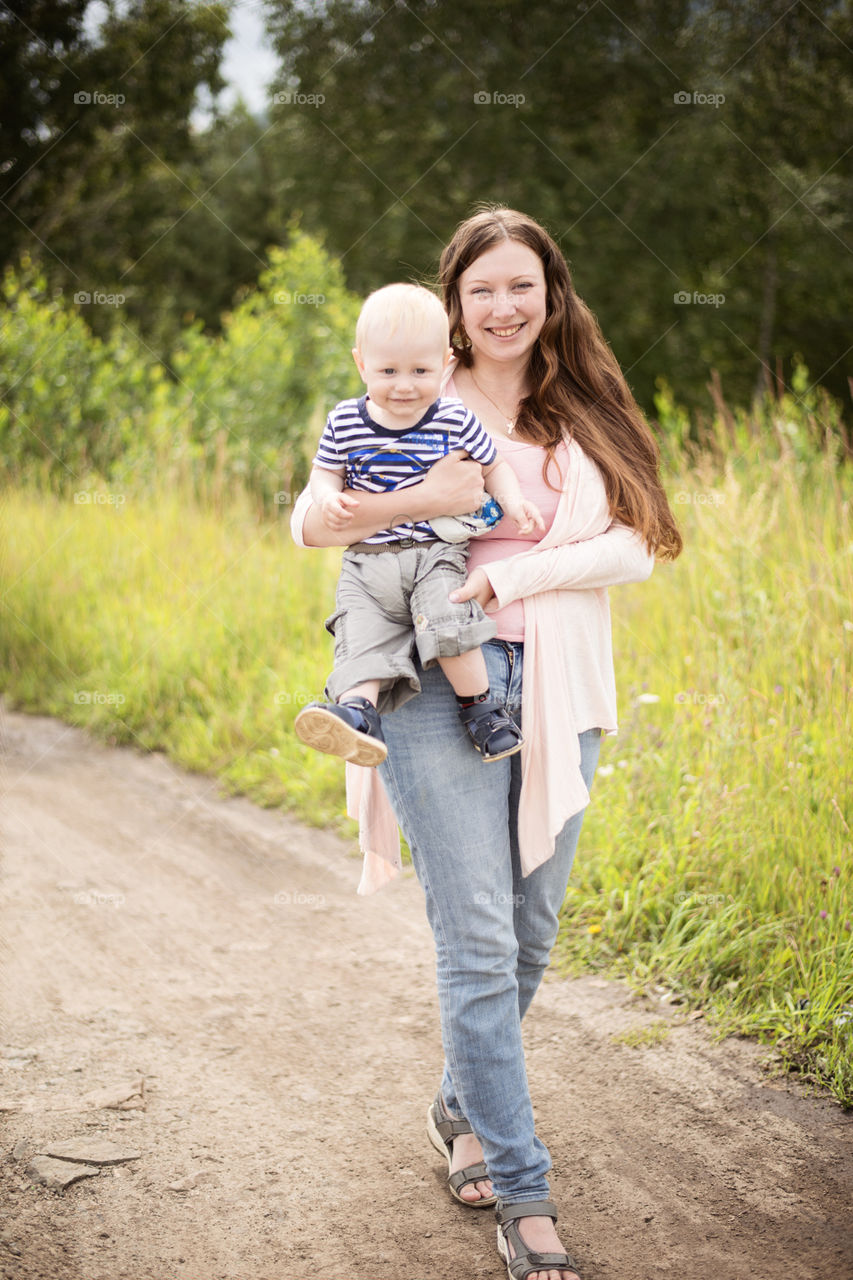 Smiling mother with her son