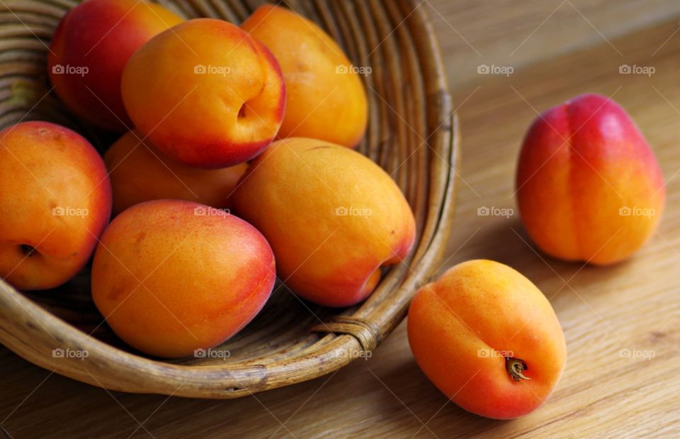 Peaches fruits on wooden background