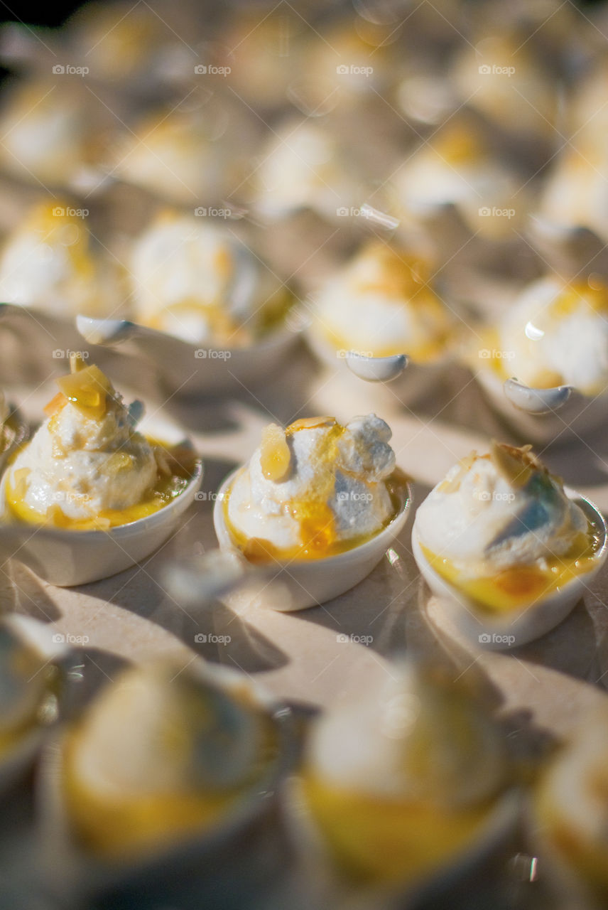 Individual dessert servings on spoons