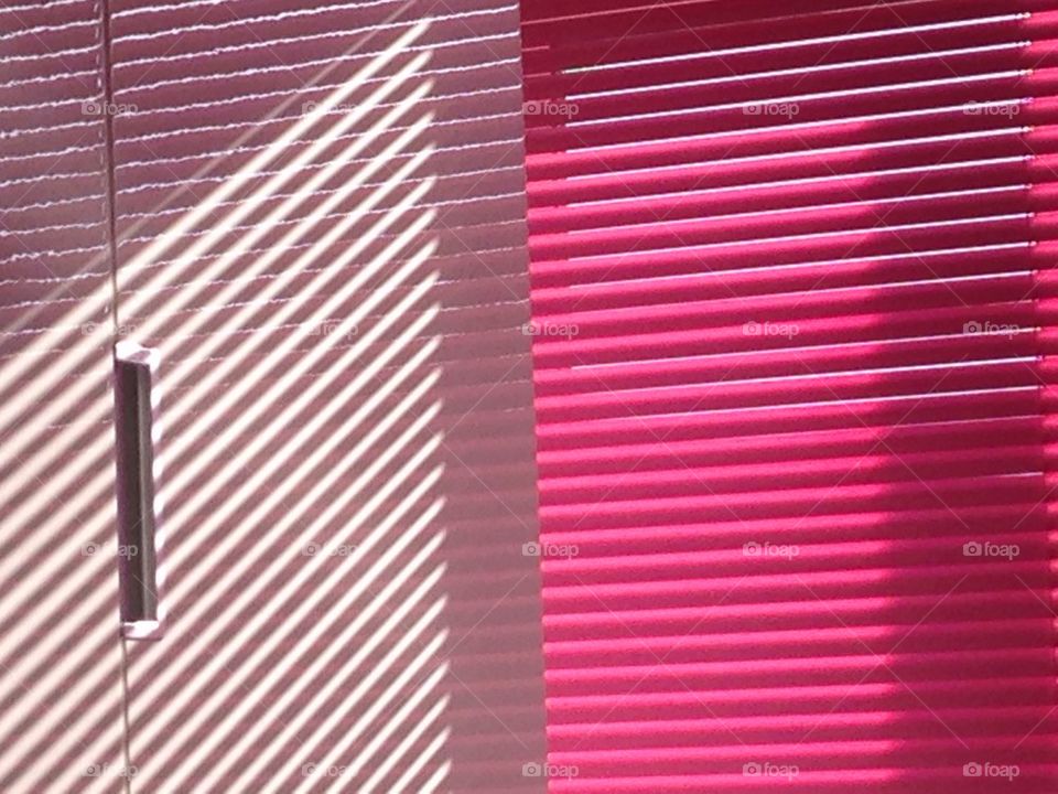 Pink blinds and shadows