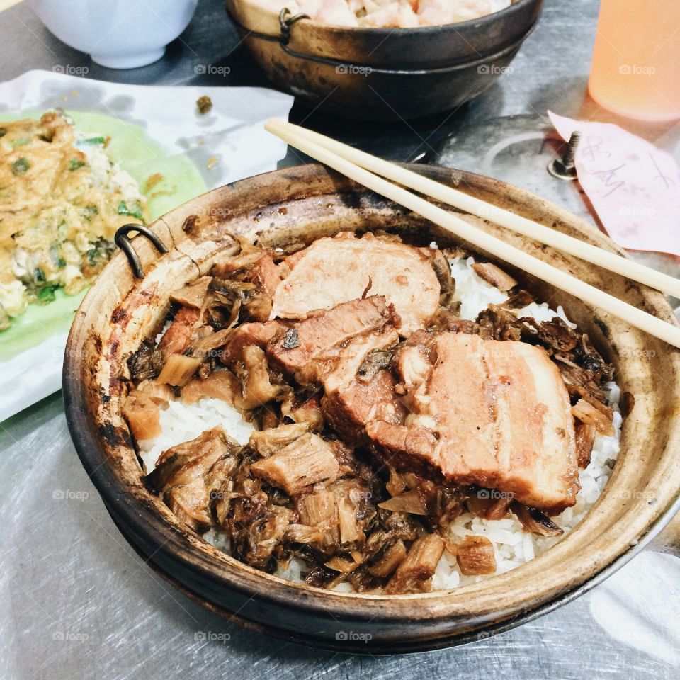 High angle view of meat with chopsticks