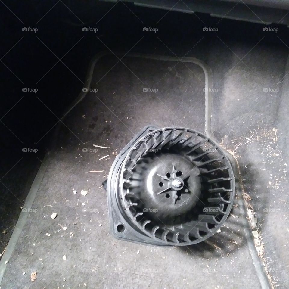Auto blower fan replacement in progress
