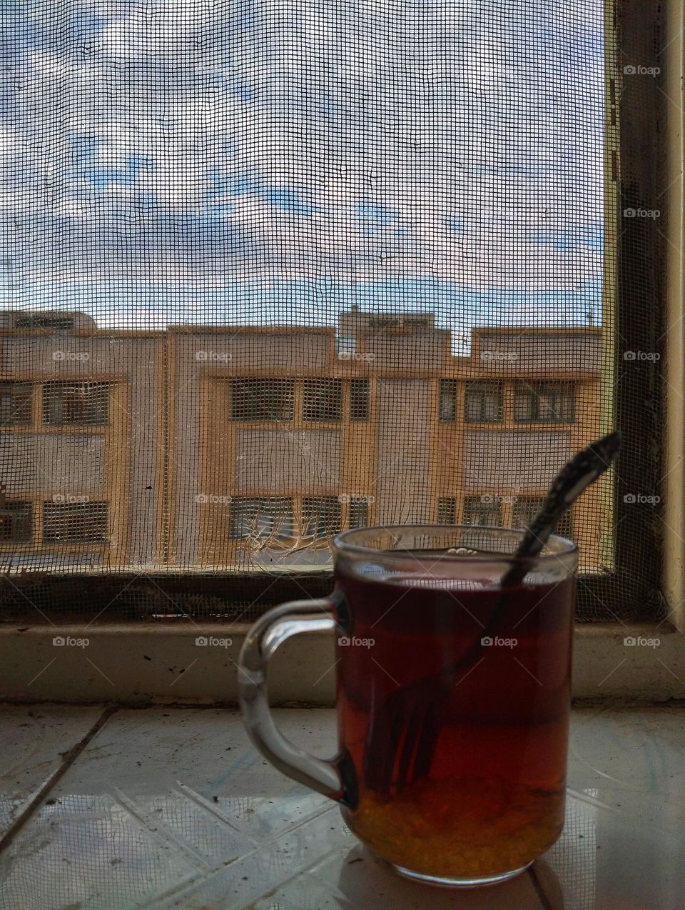 GOOD JOB . HERE YOU ARE   SWEET TEA 
Vision : BEAUTIFUL SKY above apartment