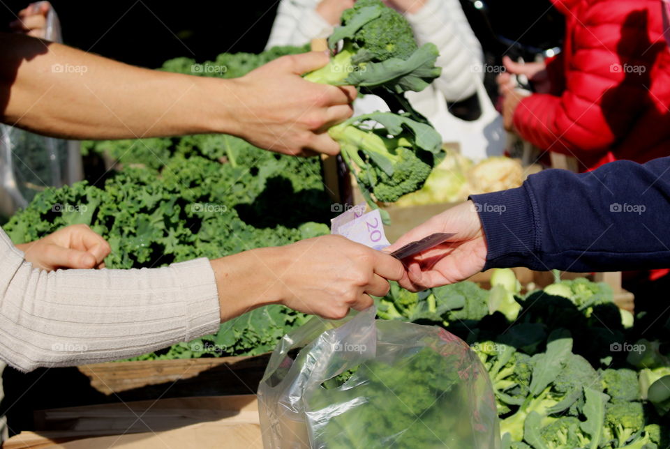 Payment at local autumn market.