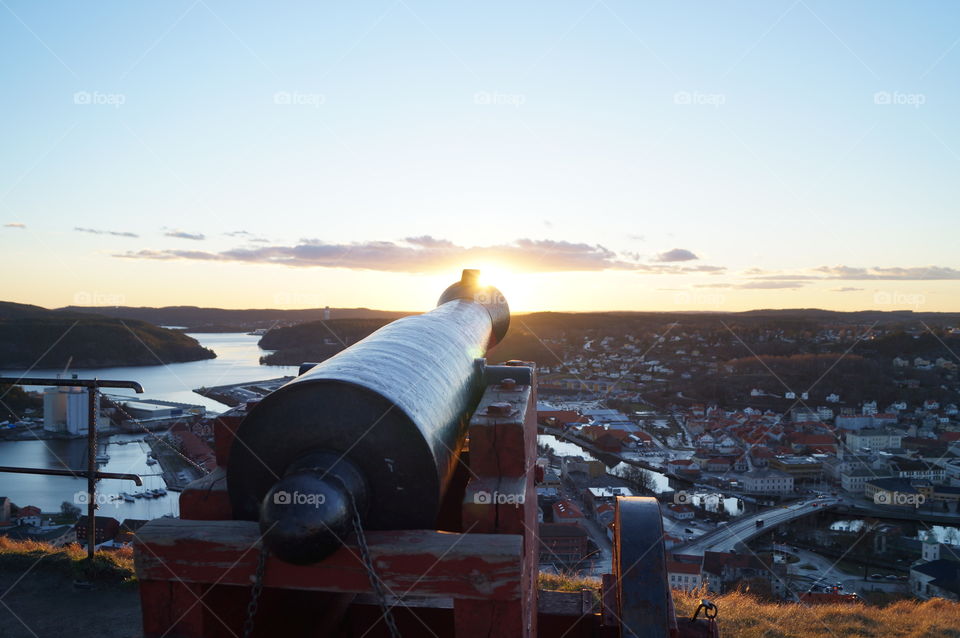 Cannon and sunset.