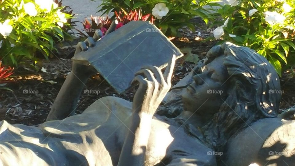 statue girl reading