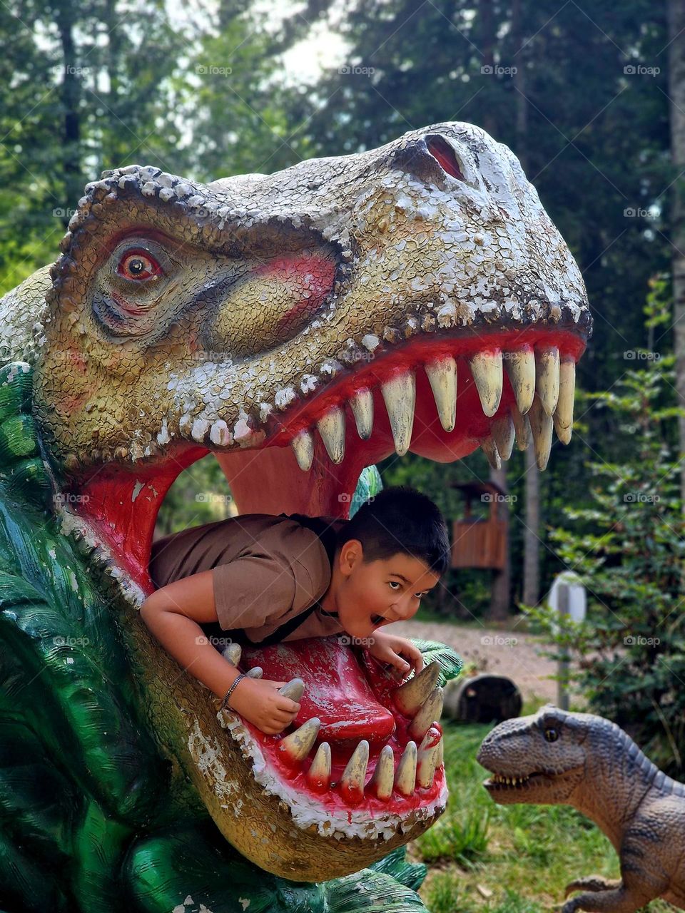 kid in dinosaur