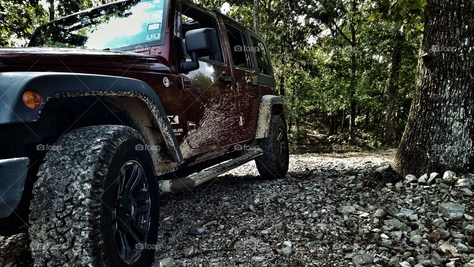 rugged jeep on a rocky trail in Arkansas.