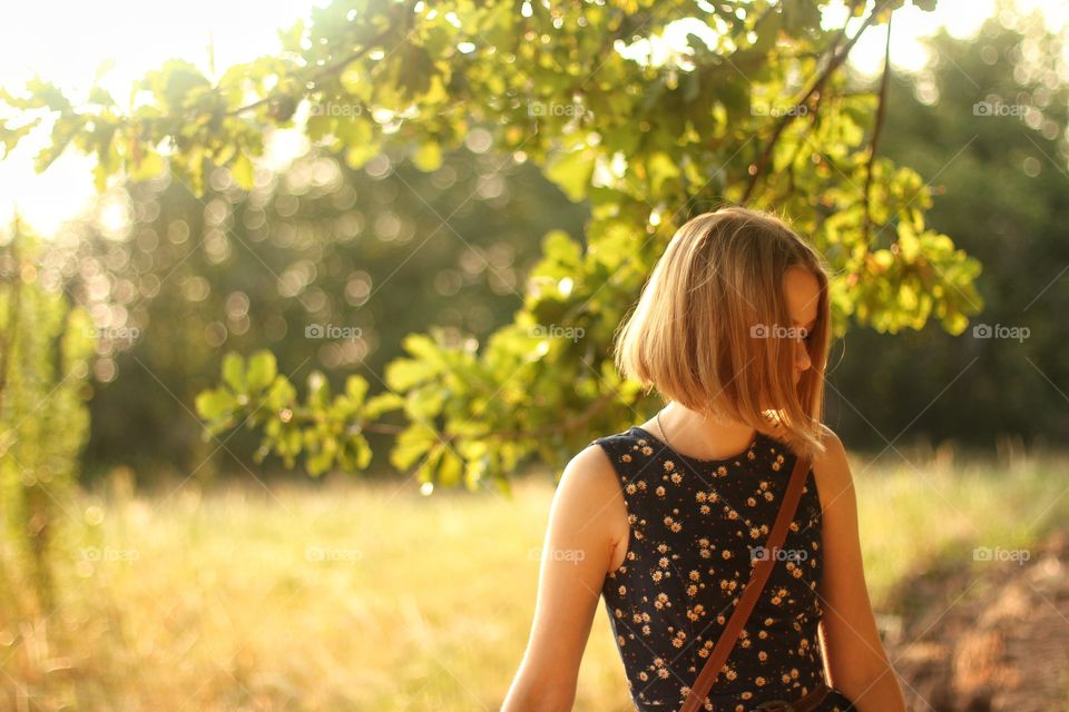 Girl walks in the park
