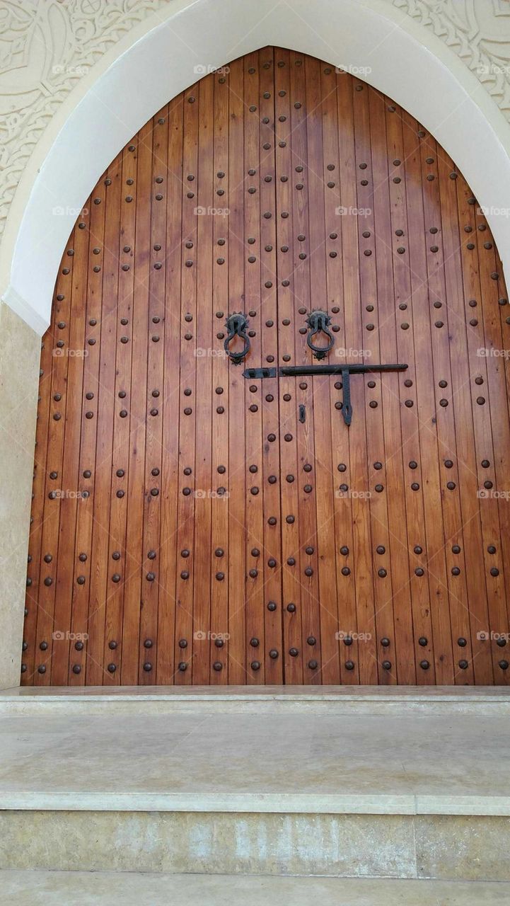 Ancient brown door made of wood