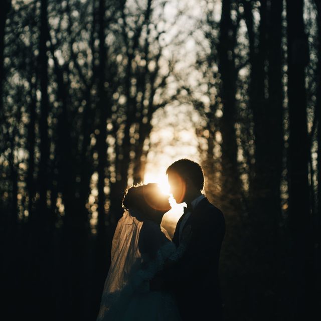 Bride and broom in forest