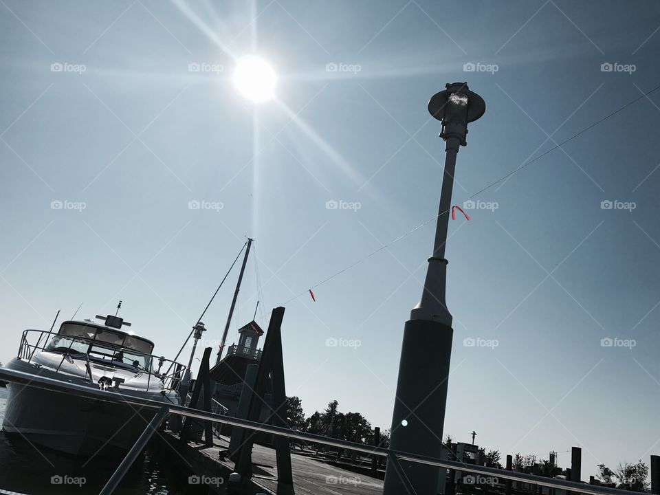 Sunlit sky on boats 