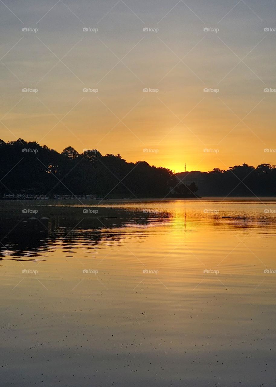 Sunrise reflection - Xuan Huong lake, Da Lat city